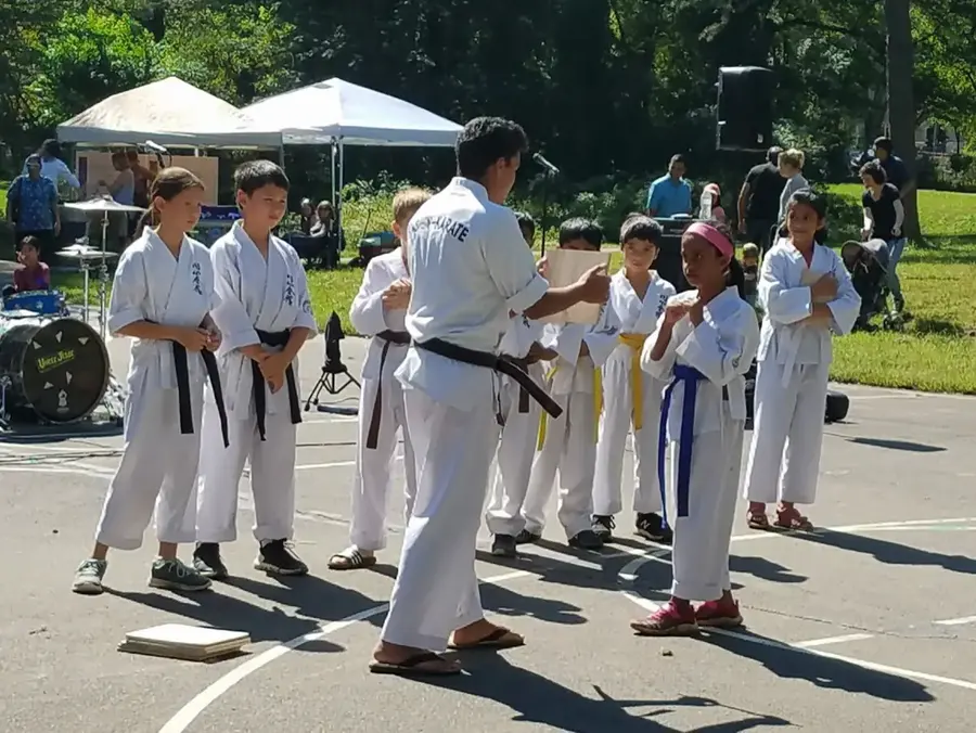 Children lined up outdoors for a group activity